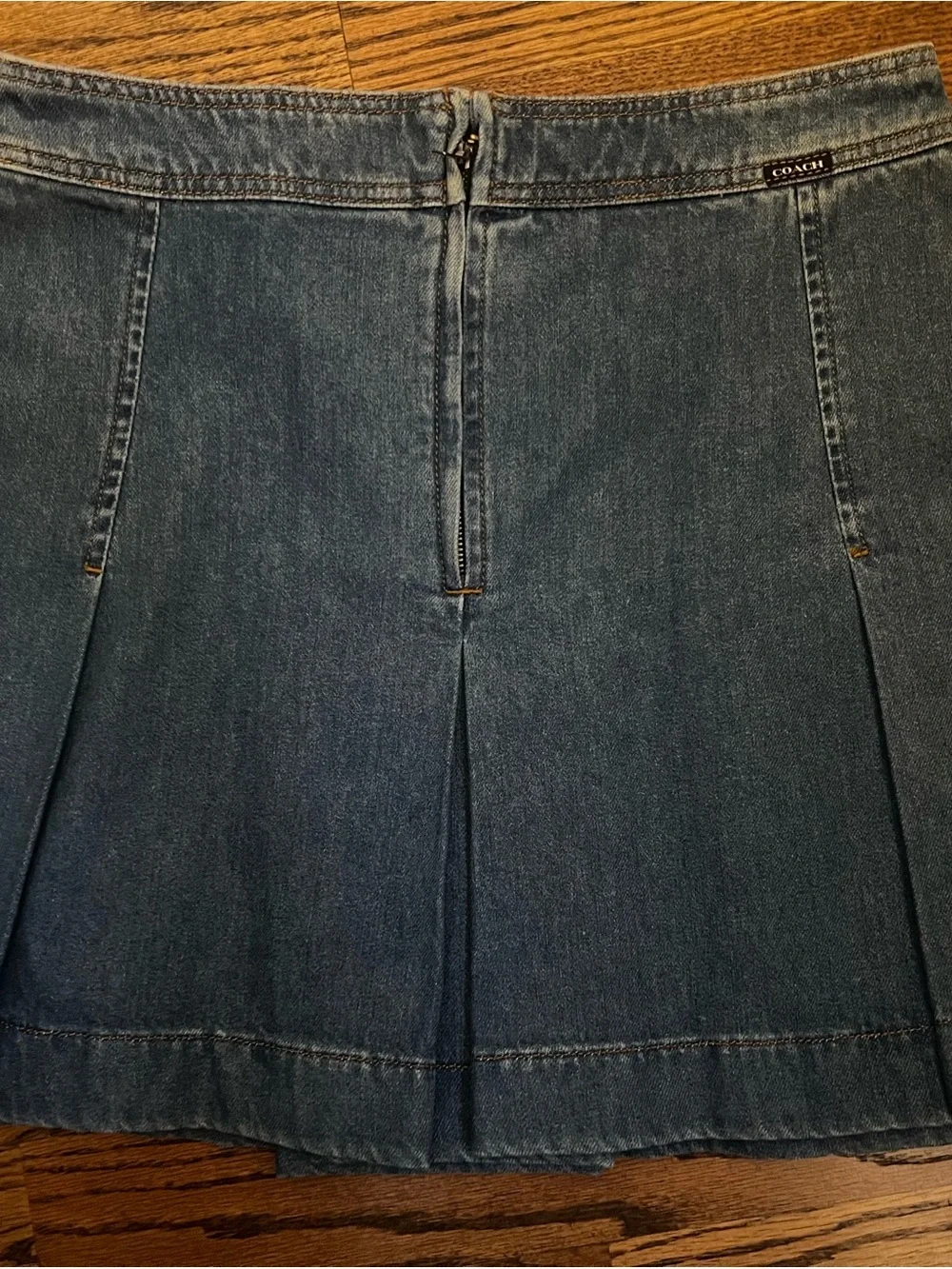 Coach Turnlock Denim Mini Skirt